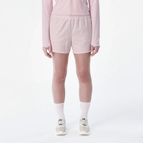 Salomon SHAKEout Core Shorts de course a pied 4 po femme – Icy Pink (porté)